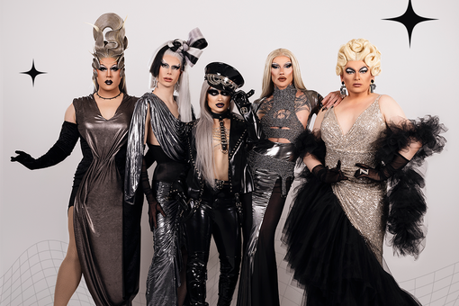Photo of five drag queens with elaborate costumes in silver, black and brown colors