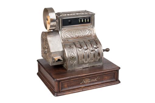 The photo shows a historic cash register from 1913