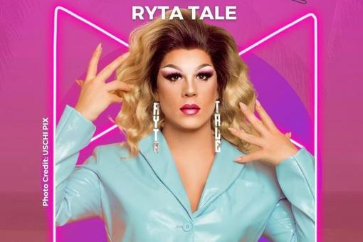 Photo of drag queen Ryta Tale in a mint top against pink background