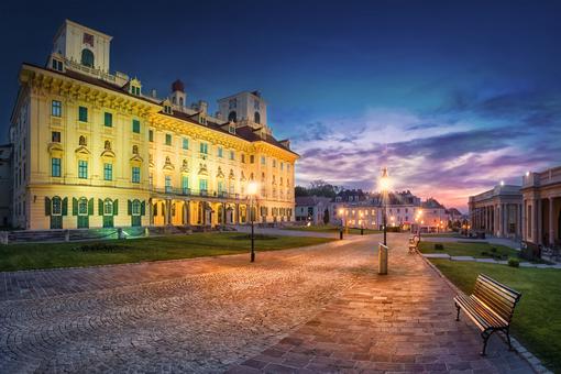 The photo shows Esterhazy Palace, exterior view of the main entrance, in an evening atmosphere