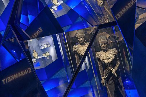 Photo shows blue slivers as if from a kaleidoscope with views from the Sisi Museum, including the black figure of Empress Elisabeth