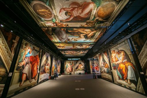 Photo shows different representations of the frescoes of the Sistine Chapel in Rome
